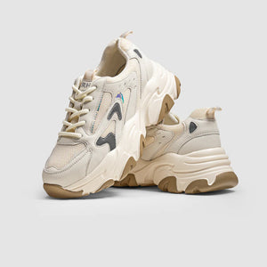 What role do women's sneakers play in self-expression and individuality, as mentioned in the blog?