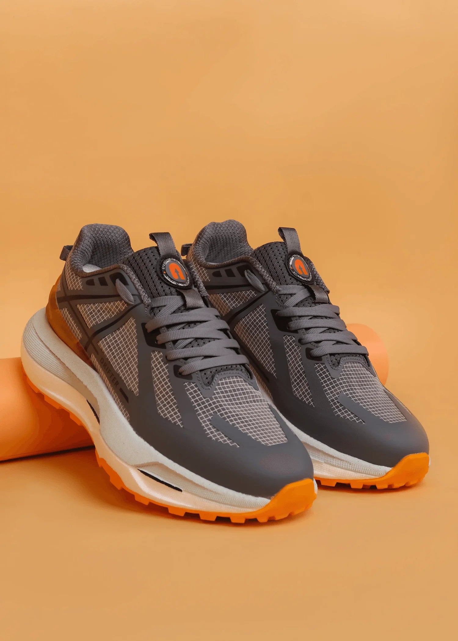 Drifter Grey Orange running sneakers front profile with laces