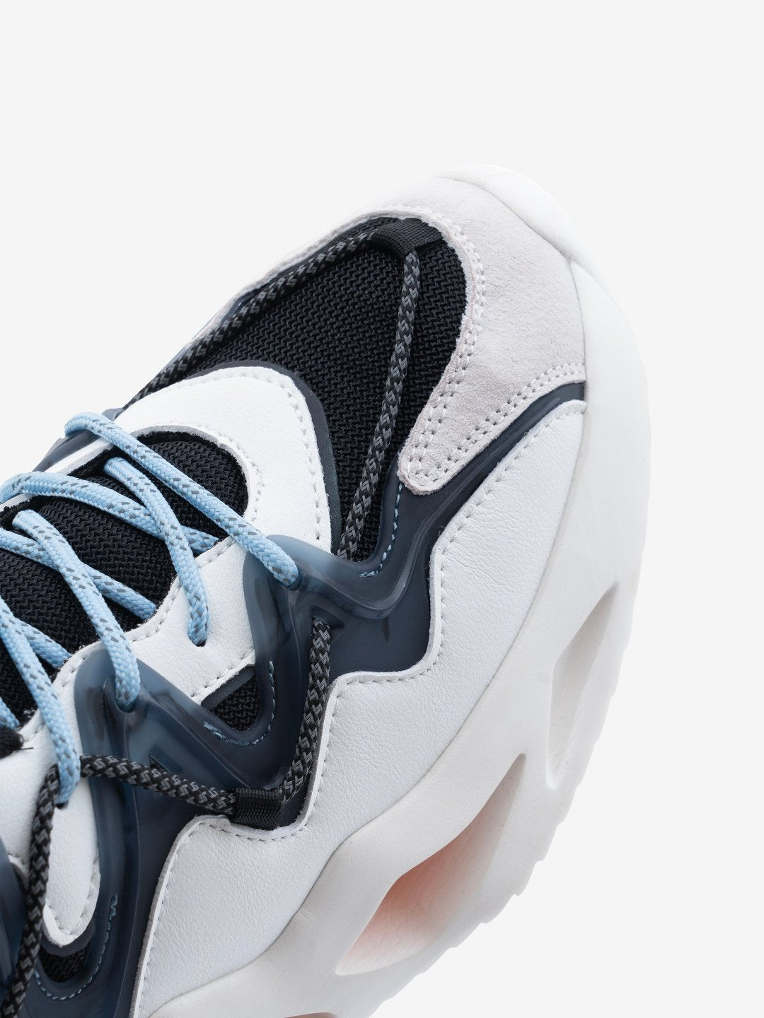 Close-up front view of Nickron Moscow Ghost White – White sneakers for men