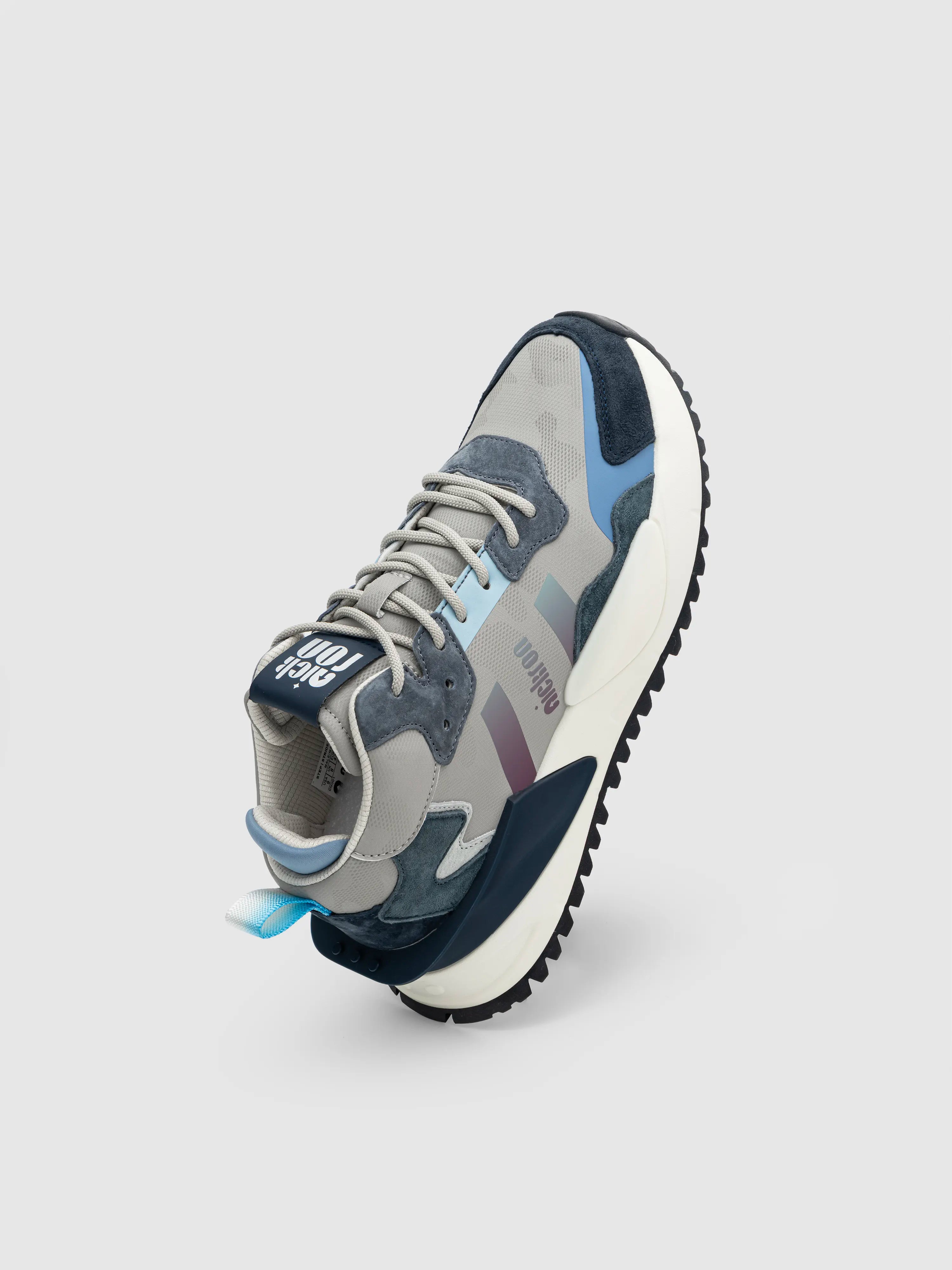 Heel detail of Sentinel Slate Blue mid‑top sneakers